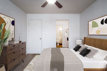A bedroom with a bed, dresser, and ceiling fan.